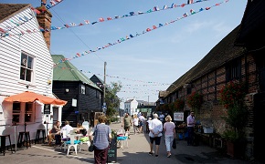Picture of Faversham Quay and people visiting the area.